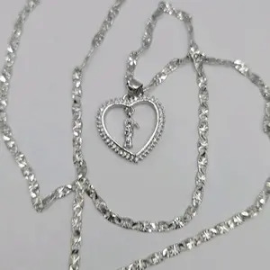 LA SANTA MUERTE/THE GRIM REAPER faahion necklace stainless steel color GOLD PLATED 24"inches