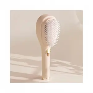 🌟Revolutionary Scalable Automatic Cleaning Anti - Static Comb! With just one click, it's a game - changer for all hair types. Pink (Button)