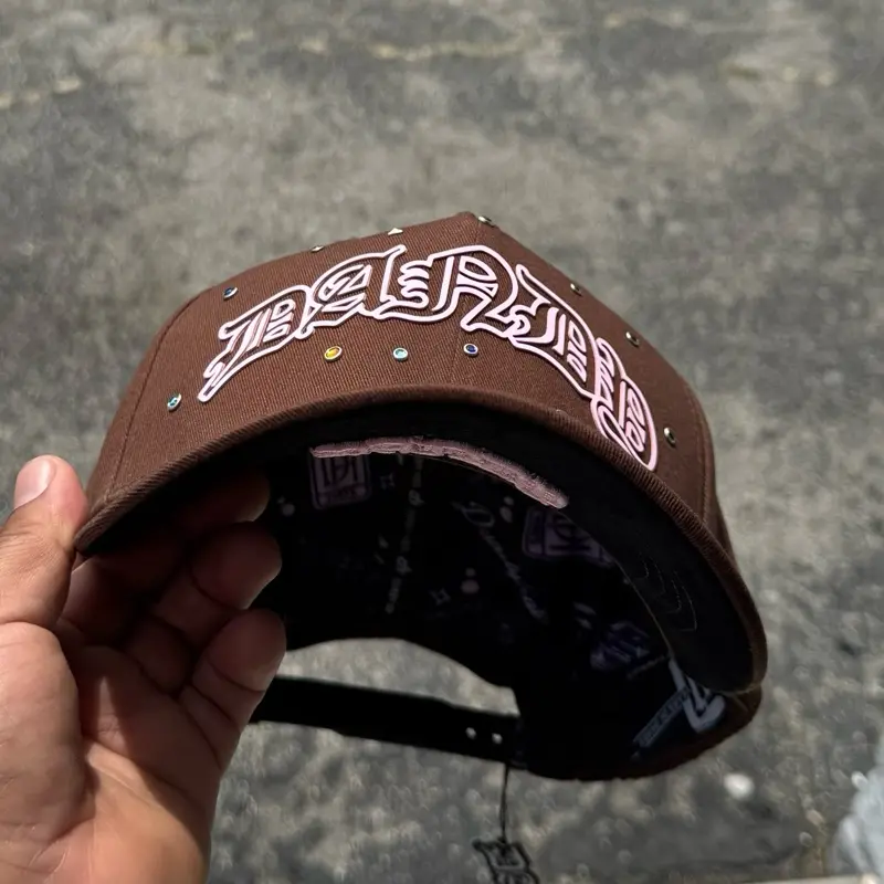 Dandy Hats 10decimo Aniversario Brown Cap with Unique Design and Decimo Text