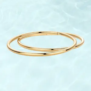 PAVOI Waterproof Bangle Bracelet for Women - 14K Gold Plated Classic Lightweight Stacking Stainless Steel Bracelet - 1-Piece & 2-Piece Bangles