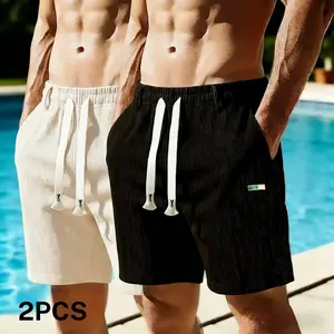 Two pairs of corduroy men’s shorts, casual minimalist style with a refined side label detail; the fabric drapes well and is skin friendly, featuring a loose, comfortable fit suitable for men who enjoy casual everyday wear.