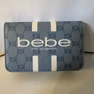 Bebe Los Angeles Wallet/Purse with White Stripes and Logo Design - Stylish and Functional Everyday Accessory for Women