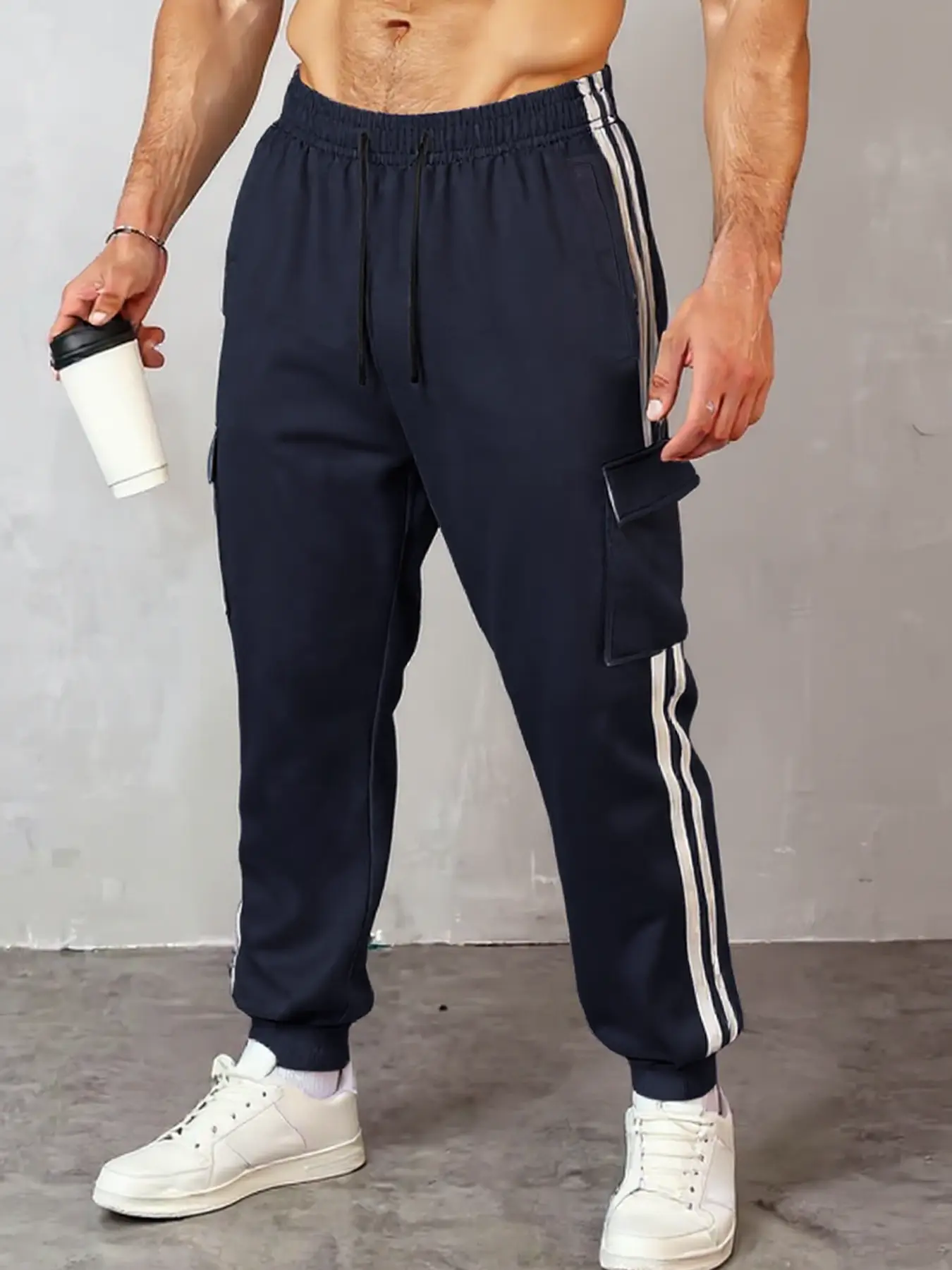 Casual sports men's elastic ankle sports pants with contrasting half side stripes and elastic drawstring waist provide excellent training performance and casual street style Athletic Bottoms Activewear Bottoms