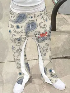 1 piece of men's high street retro, Vintage bell bottom pants with Paisley pattern, paired with plant branches, leaves, and flowers. The base color is light beige, with blue and white as the main colors, blending retro and street