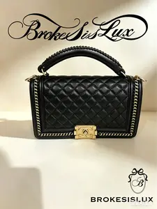 Pre-owned CHANEL Black Lambskin Quilted Boy Flap Bag with Braided Handle