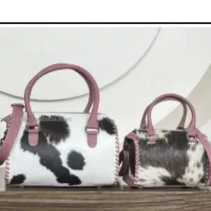 Pink handle cowhide speedy