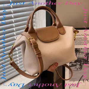 Women's bags popular bags versatile messenger bags new women's bags fashionable and simple hand carry shoulder small bucket bag