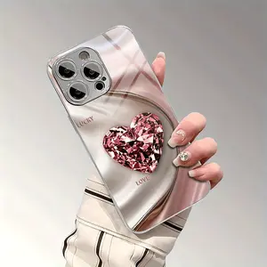 This pink heart-shaped diamond wave pattern TPU full-coverage lens electroplated silver glass phone case is drop-proof and non-slip, suitable for iPhone 17, 16, 15, 14, 13, 12, 11, Samsung and other models. It makes a great gift for friends or family.