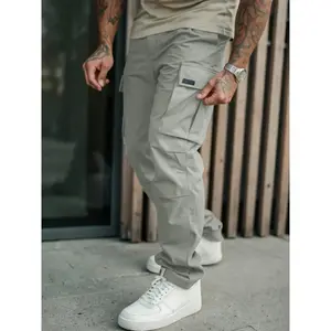 Men’s military work pants with a loose, multi-pocket design, perfect for outdoor activities and everyday wear GARMENTARY
