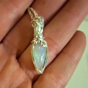 Opal wrapped in Argentium silver