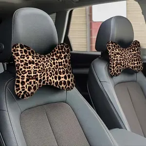 A leopard print fashion car headrest provides driving comfort. Made of breathable fabric, it features adjustable neck support. Suitable for car seats, driving, and travel. Car Accessories