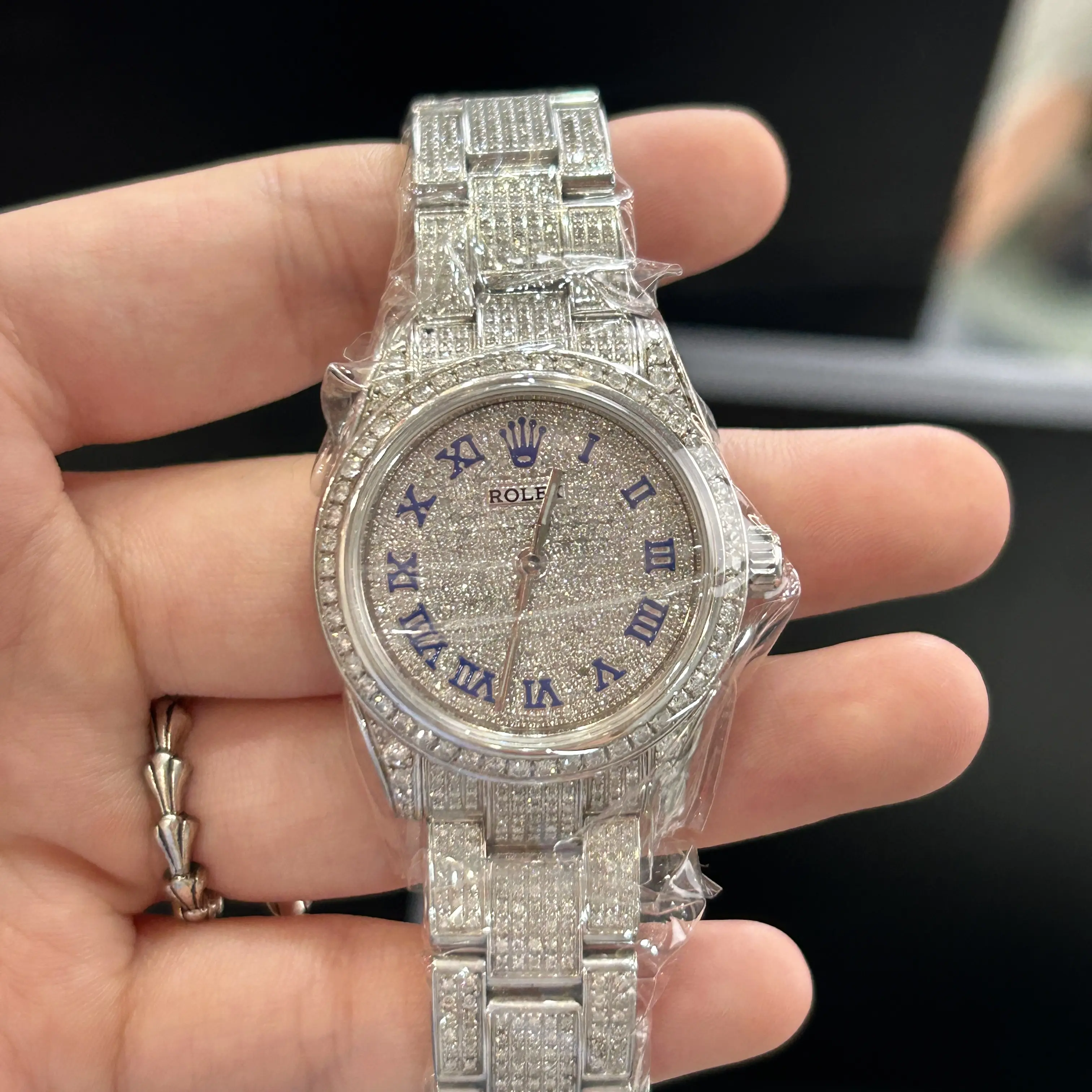 Rolex Oyster Perpetual 31mm 177200 Automatic Stainless Steel Aftermarket Full Diamond Paved Case, Bezel, Bracelet and Dial Blue Roman Numerals Ladies Watch WHP042274