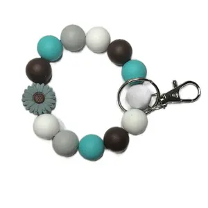 Blue and Brown Flower Keychain with Colorful Beads and Floral Accent