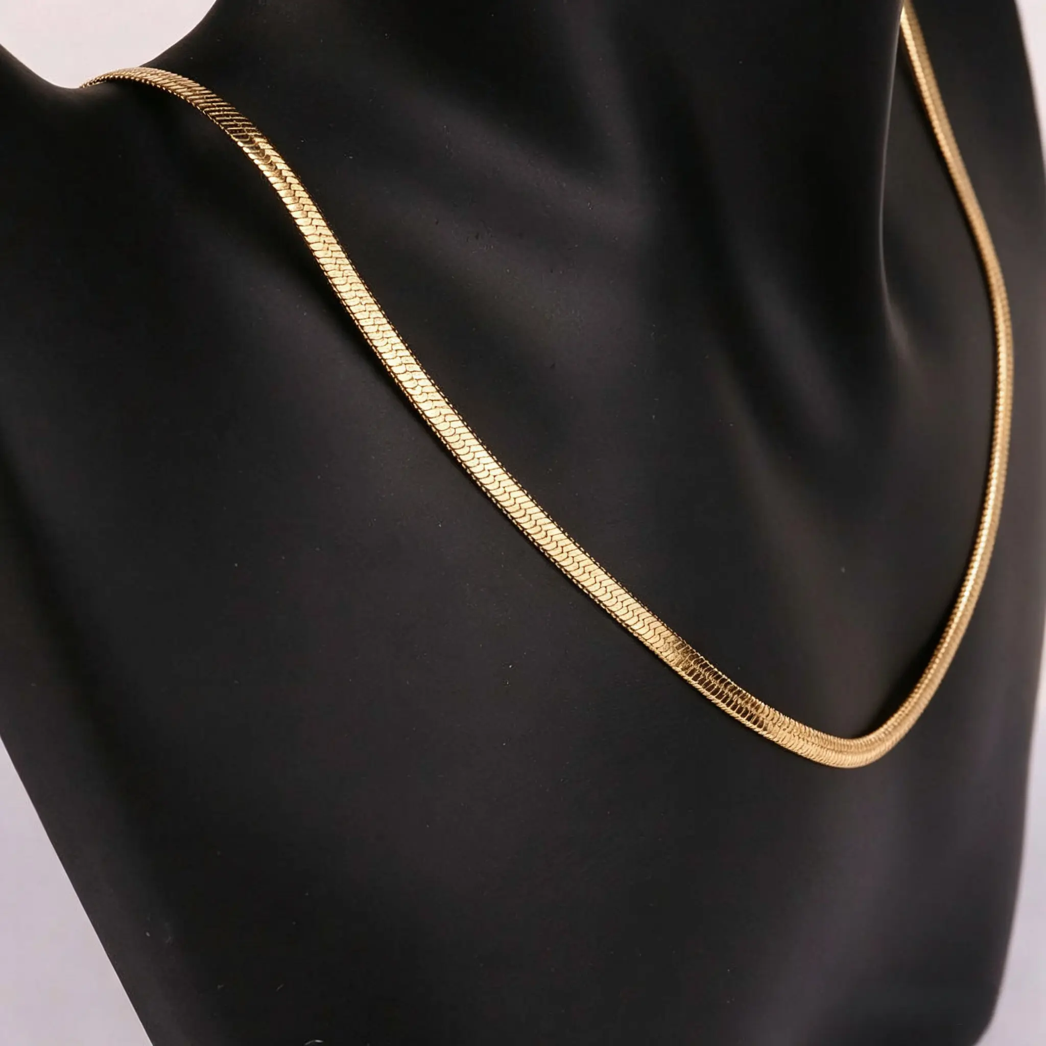 Women's Gold-Tone or Silver-Tone Stainless Steel Herringbone Clavicle Necklace - Flat Snake Chain, Smooth Shine, Casual Daily Wear, Stylish Costume Jewelry Gift for Teen Girls