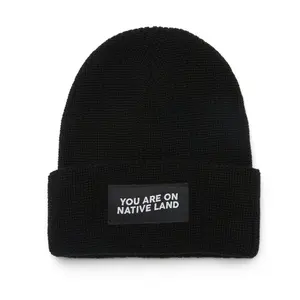 'YOU ARE ON NATIVE LAND' RIBBED BEANIE