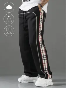 Men’s casual color-block striped plaid long pants with a drawstring waist and pockets; straight-leg color-block casual athletic pants—a fashionable piece for spring, summer, and autumn.