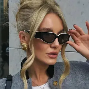 New retro cat-eye fashion sunglasses for women — high-end luxury color-matching outdoor simple personalized sunglasses.