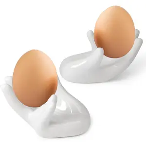 2 Pcs Creative Ceramic Egg Stands, Porcelain Egg Holders Hand Shaped Egg Cups Holder for Hard Boiled Eggs in Living Room, Restaurant and Dining Table for Breakfast, Display
