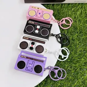 4pcs Vintage Mini Radio Recorder Keychains, Nostalgic Bag Ornaments with Retractable Heart Clip & Scrunchie Lanyard, Cute Daily Accessory for Teacher Appreciation Gifts (Sports & Outdoor Fan Shop Gaming Accessory)