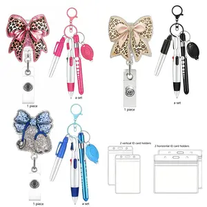 Leopard print bow shiny badge clip made of acrylic; includes a set of 5 keychains, a round ball pen, a marker, an ELD light, and a waterproof card combo; suitable for office staff and students—shine badges and accessories. outdoorfun