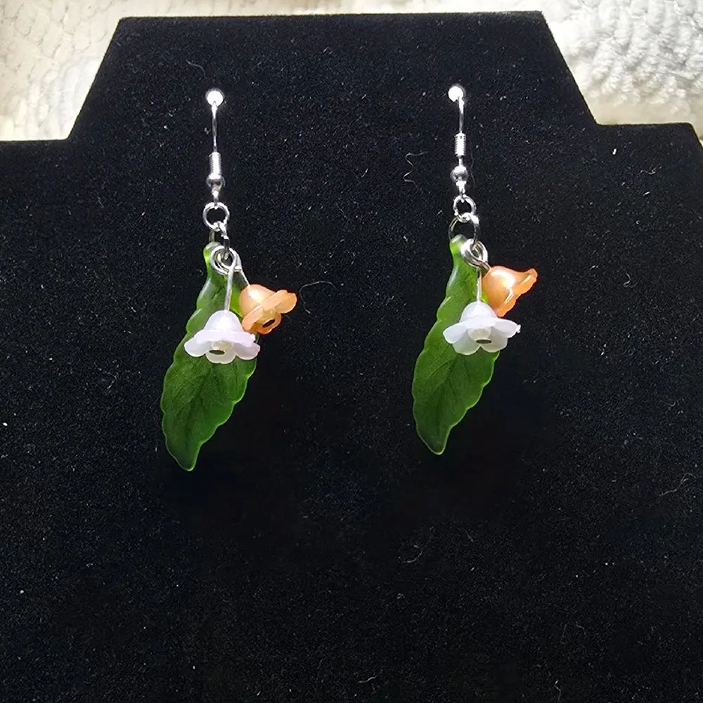 Lily of the Valley Earrings - White Flower Design with Green Leaves and Orange Accents on Silver Hooks