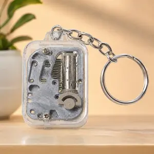 Vintage Music Box Keychain - Portable Wind-Up Toy, Unique Desk Decor for Stress Relief, Custom Gift for Birthdays & Holidays, Collectible Craft for Music Lovers, Relaxation Aid, Perfect Keepsake for All Ages