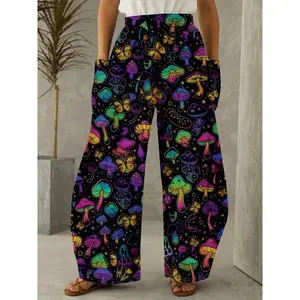 Women’s large, colorful butterfly and mushroom print wide-leg casual street pants, loose fit with an allover print—fashionable for year-round wear.