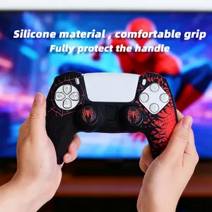 PS5 controller non-slip silicone protective cover, soft shockproof controller shell with ergonomic grip design, includes a touchpad spider sticker and two spider-style joystick caps.