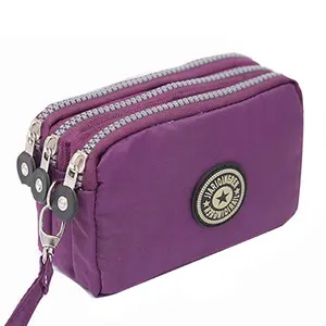 Multi-Function Coin Purse, Women's Wallet, Money Bag Purse, Credit Card Holder, Key & Phone Organizer with Zipper Closure, Waterproof Designer Wristlet. Suitable for Daily Commuting, Dating, or Shopping, Features Durable Nylon Material for Easy Cleaning