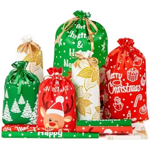 JOYIN 36 PCS Christmas Drawstrings Gift Bags Assorted Sizes, Xmas Foil Reusable Wrapping Gift Plastic Bag (Large Medium Small) for Christmas Holiday Party Decorations