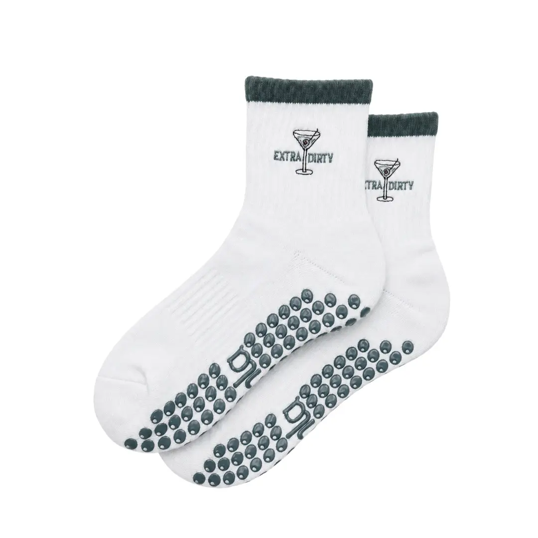 The Dirty Martini Embroidery Grip Sock with olive-shaped grips for Pilates, Barre, Lagree, and Yoga