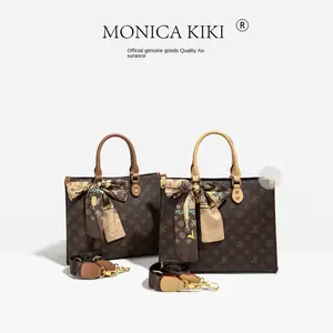Monica Qiqi Light Luxury European Station Large Capacity Hand-Held Tote Bag Female 2026 New One-Shoulder Commuter Practical