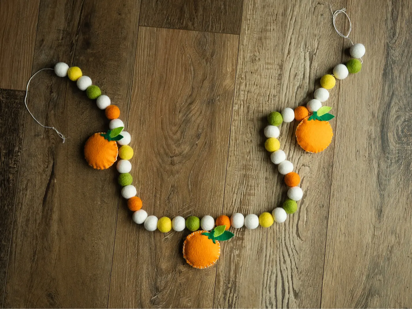 Handmade Felt Pom Pom Garland with Orange Accents | Cheerful Home Decor