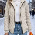 Women's winter hooded jacket with a fleece lined interior for added warmth and thickness.Wear resistant, abrasion resistant fabric with pockets.Loose long sleeve basic piece for everyday wear, suitable for daily commuting, shopping, and outdoor skiing act
