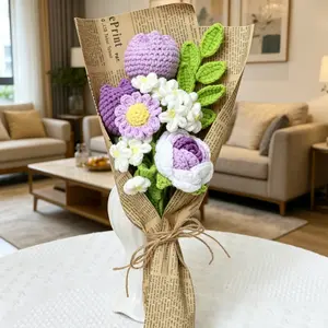 A beautifully wrapped bouquet of handcrafted yarn flowers—featuring elements such as roses, forget-me-nots, and tulips—serving as a warm and soft decorative accent, perfect for friends and family.