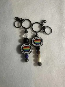 Safe space pride keychain