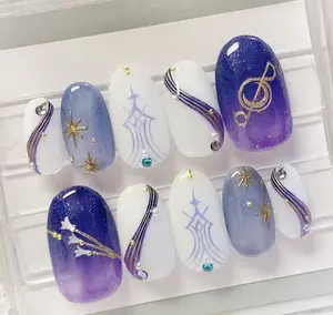 Celestial Melody Nails — gradient lavender and white tones with gold stars, pearls, and musical accents capturing a dreamy harmony of night sky elegance.
