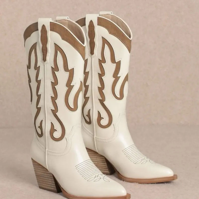 Samara Boots -Western Mid Boots  -Embrace a feminine and flirty style at your next rodeo with the IDALY - Western Mid Boots. Crafted from smooth faux leather, these mid-calf boots are perfect for any festival scene, featuring a classic pointed-toe and int