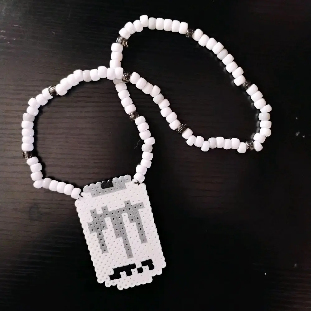 white and silver energy drink kandi necklace