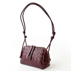 Bottega Veneta Crossbody Concert Pouch 15 Nappa Intrecciato Leather Icon Burgundy Soft Nappa Leather Adjustable Strap Top Zip Closure