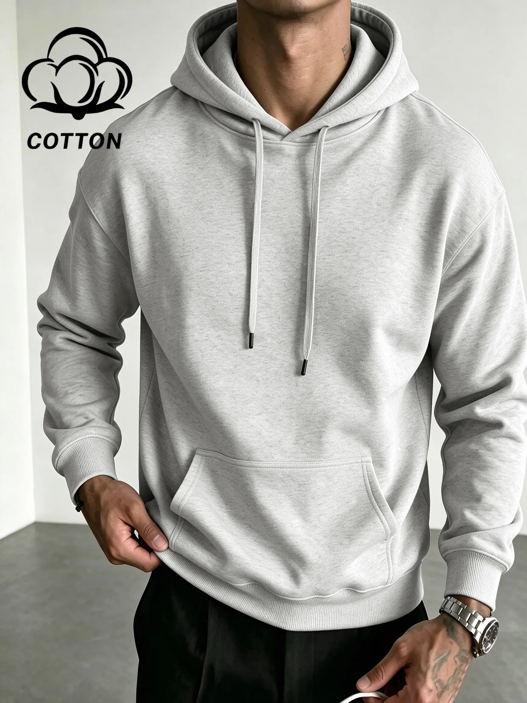 Loose-fit cotton hooded sweatshirt featuring classic hood structure metal tipped drawstrings large front pouch pocket thick skin-friendly cotton textile comfortable everyday cut essential basic piece for urban casual mensfashion outfits