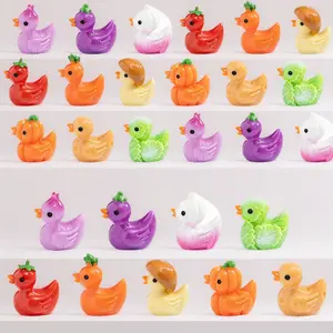 45 pcs mini animals figures set includes small resin ducks figurines and tiny miniature plastic animals featuring vegetable and duck combinations in novel designs perfect for Easter party favors gifts