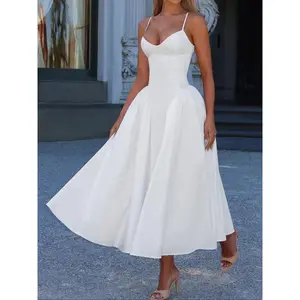 Elegant sleeveless dress in a solid color with a waistline design, tailored fit, and a solid color pattern, suitable for various occasions. GARMENTARY