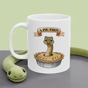 Pie-Thon Snake Mug – Hilarious Pie-Python Pun Mug, Cartoon Snake in Pie Ceramic Coffee Cup, Novelty Gift for Snake Lovers, Bakery Fans, or Pun Collectors – Dishwasher & Microwave Safe, Available 11oz & 15oz