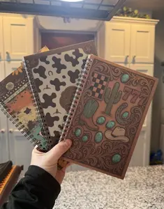 Western style notebook with lined pages and a spot for a date