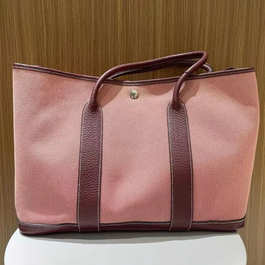Pre-owned HERMÈS cowhide Shoulder Bags HERMES Garden Party 36 Pink Canvas Garden Bag Crossbody Bag