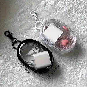 PrimPick Two transparent mini cable storage boxes, a portable cable storage box, and a charger with a keychain, suitable for travel and daily carrying
