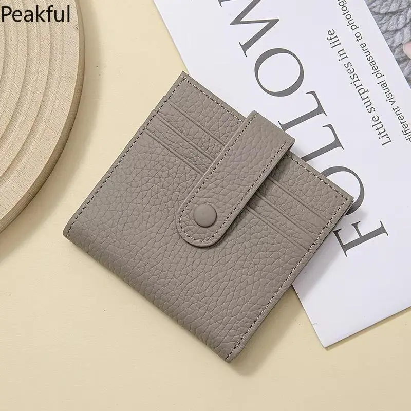 Genuine Leather Women RFID Blocking Ultra-Thin Mini Short wallet Small women's two-fold purse with 9 Cards Slots, 1 Coin pocket