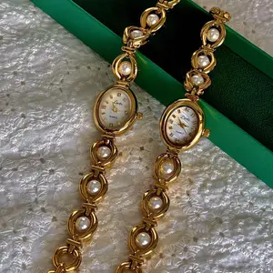 Vintage-InspiredWomen'sQuartzWatchwithPearlBracelet-Golden-ToneOvalAnalogDisplay,AlloyCase&Band,Non--IdealGiftforValentine's,Easter,Birthdays,Mother'sDay