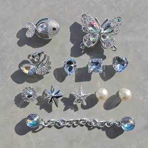 Crystal Butterfly Clog Accessory Set – Includes swan, fish, rhinestone heart, star, starfish, pearl chain, detachable shoe buckle; compatible with fleece clogs; DIY decoration only; no shoes included